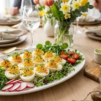Easter table with deviled eggs and spring vegetables