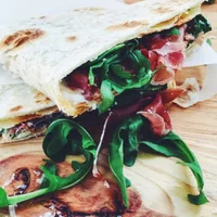 Piadina: Italian flatbread with Parma ham, mozzarella and grilled pepper