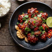 Spicy gochujang chicken with garlic and lime