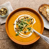 Creamy pumpkin soup with coconut and ginger