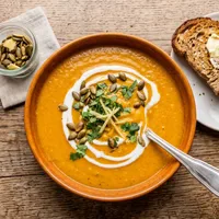 Creamy pumpkin soup with coconut and ginger