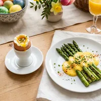 Soft‑boiled Easter egg with green asparagus and hollandaise sauce