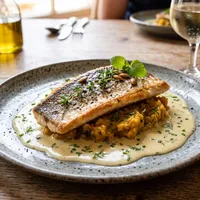 Sea bass fillet with pumpkin compote and beurre blanc