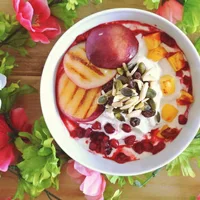 Summer breakfast with grilled nectarine and mango