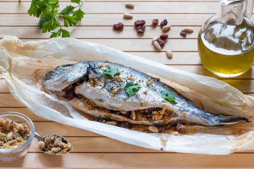Dorada al papillote a la siciliana