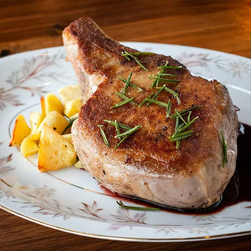Schweinekoteletts mit Bratäpfeln von Erick Williams