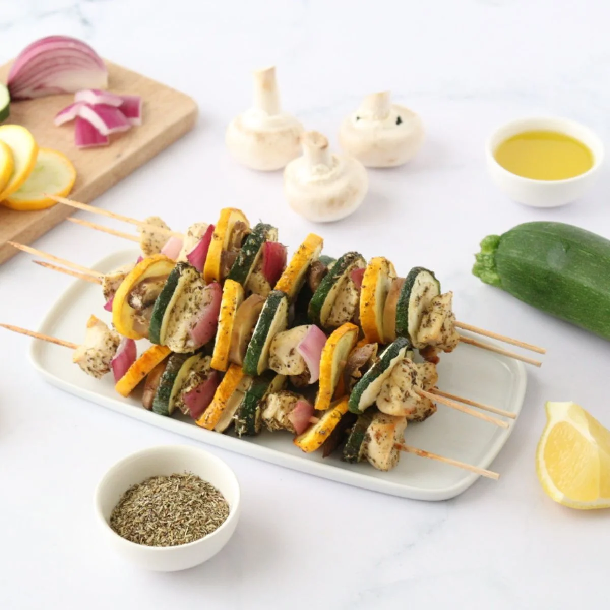 Lemon-marinated chicken skewers