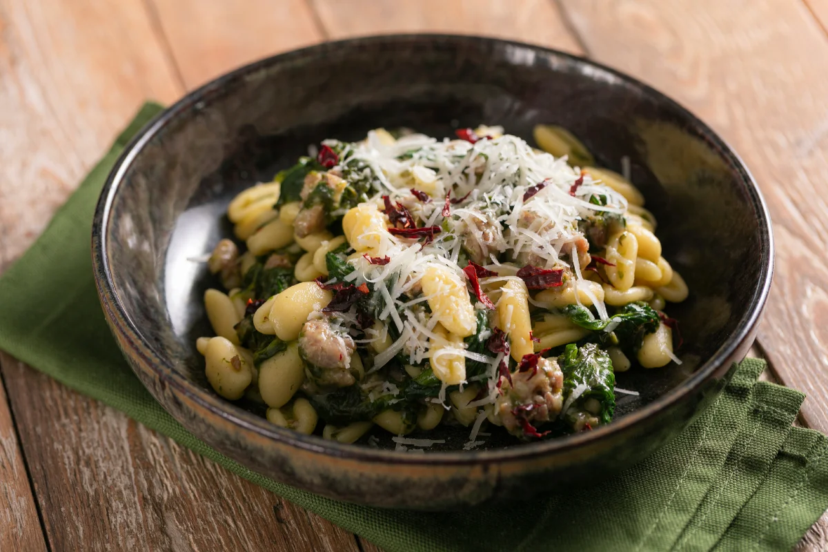 Cavatelli with sausage, turnip greens and dried chilli