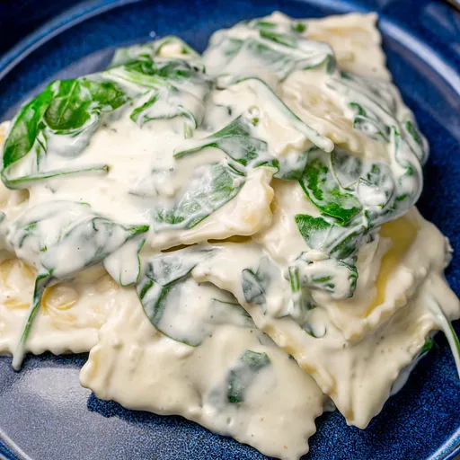 Spinach and Cheese Ravioli in a Creamy Sauce