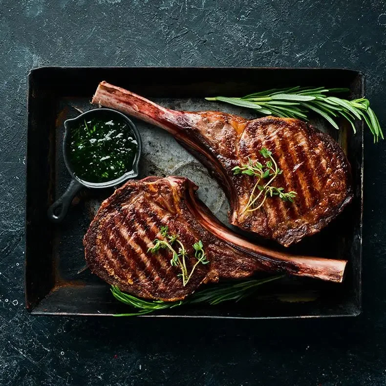 Tomahawk Ribeye Steak with Melted Herb Butter