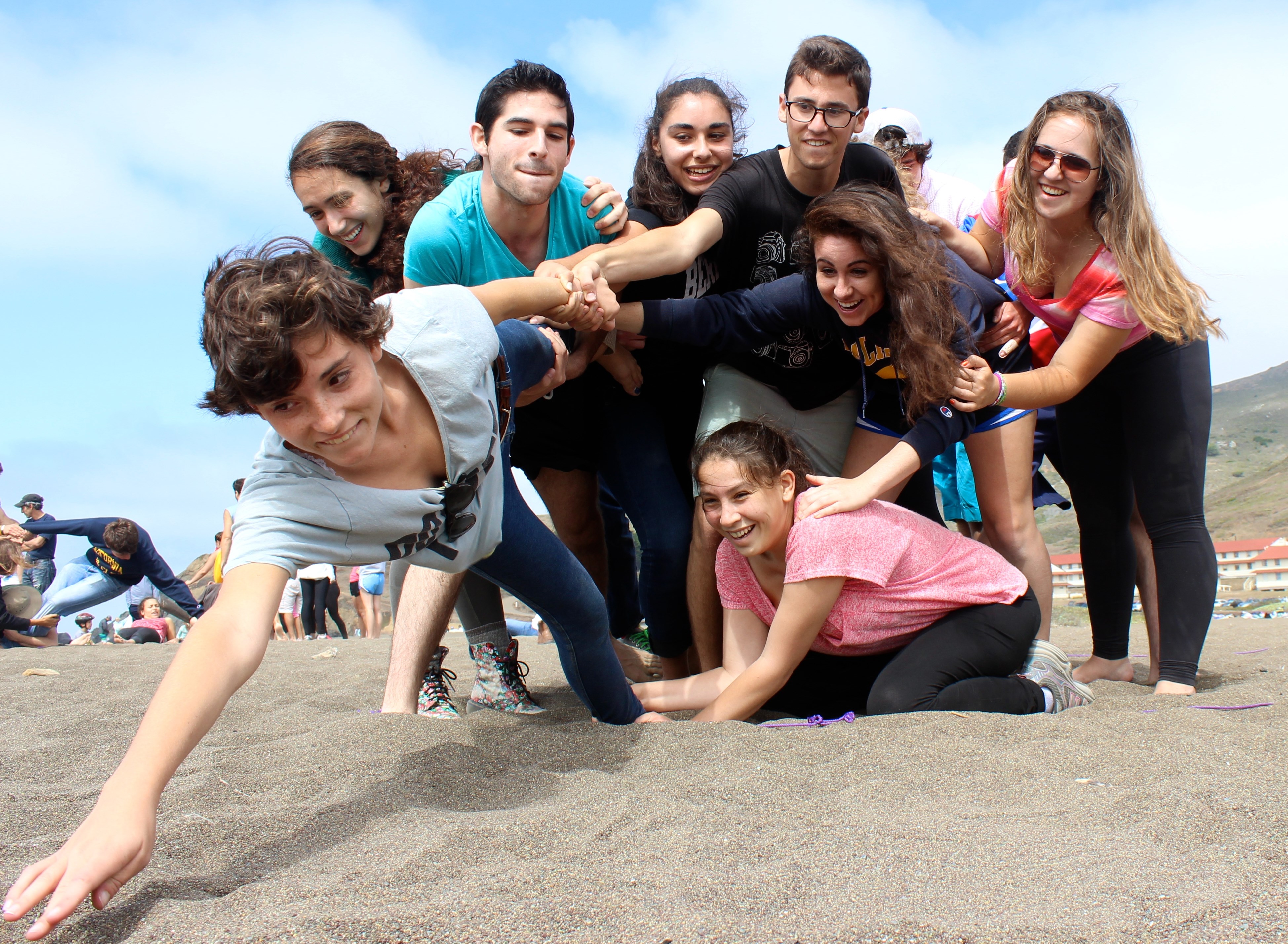 Photo of Jewish students having a fun time at the beach