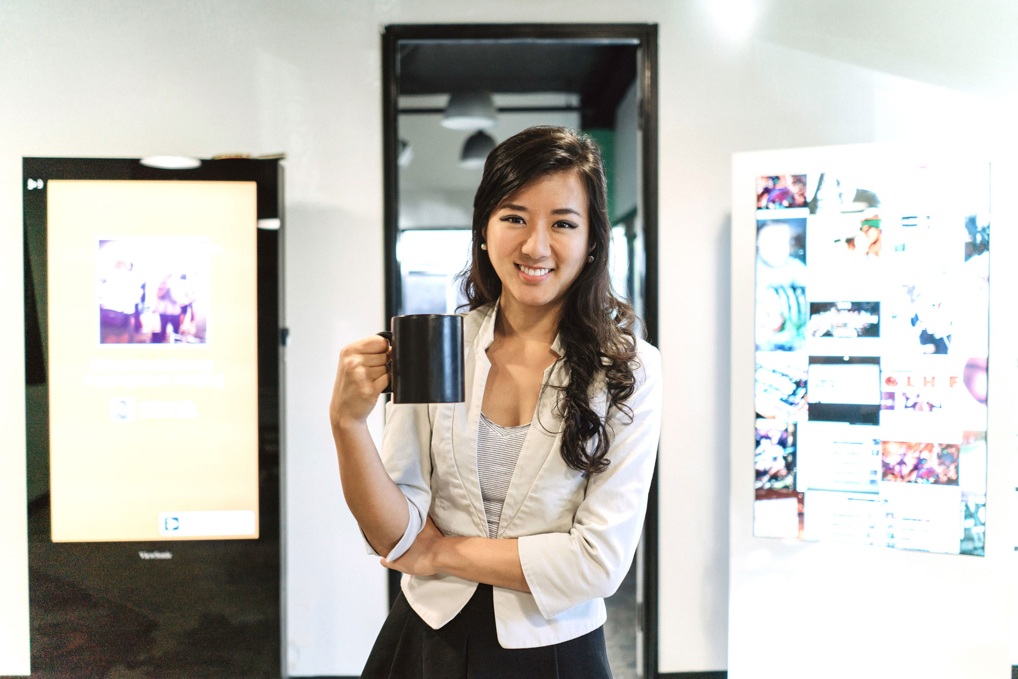 Photo of Nanxi Liu ’12 holding a cup of coffee