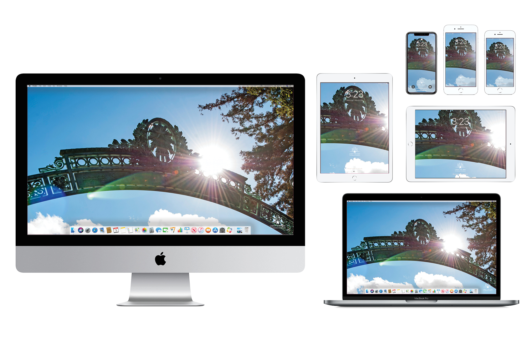 Wallpaper with an image of the top of Sather Gate silhouetted in sunlight