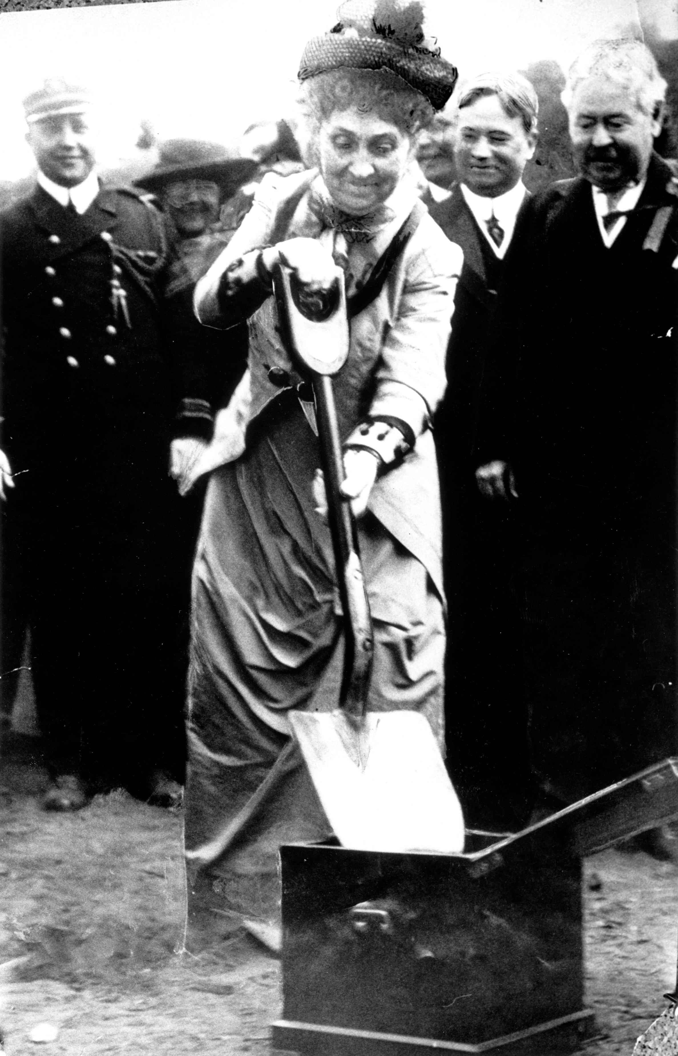 Historic photo of Phoebe Apperson Hearst breaking ground with a shovel.