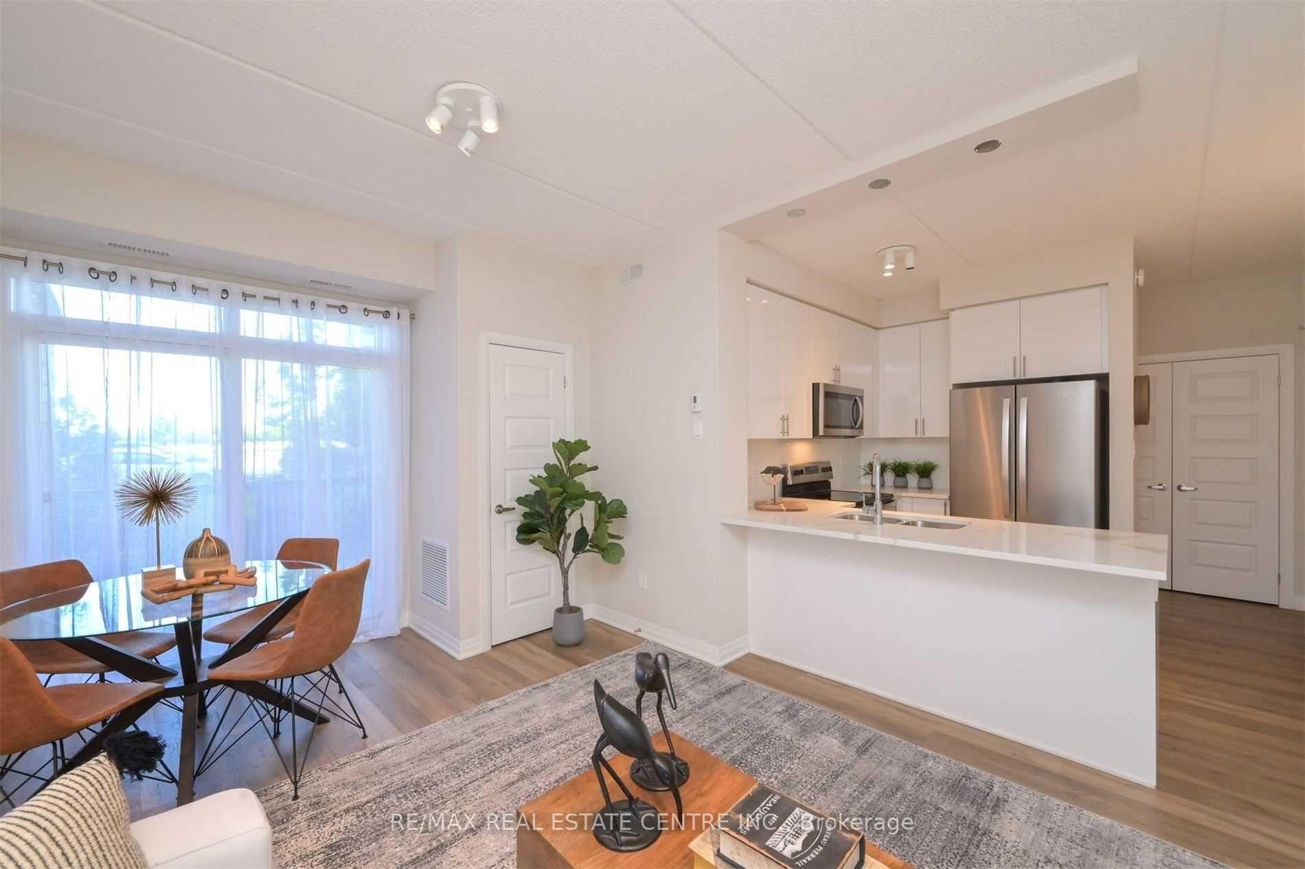 102 - 610 Farmstead Drive Milton Ontario Canada Sale residential Oliver Teekah RE/MAX Real Estate Centre Inc., Brokerage*