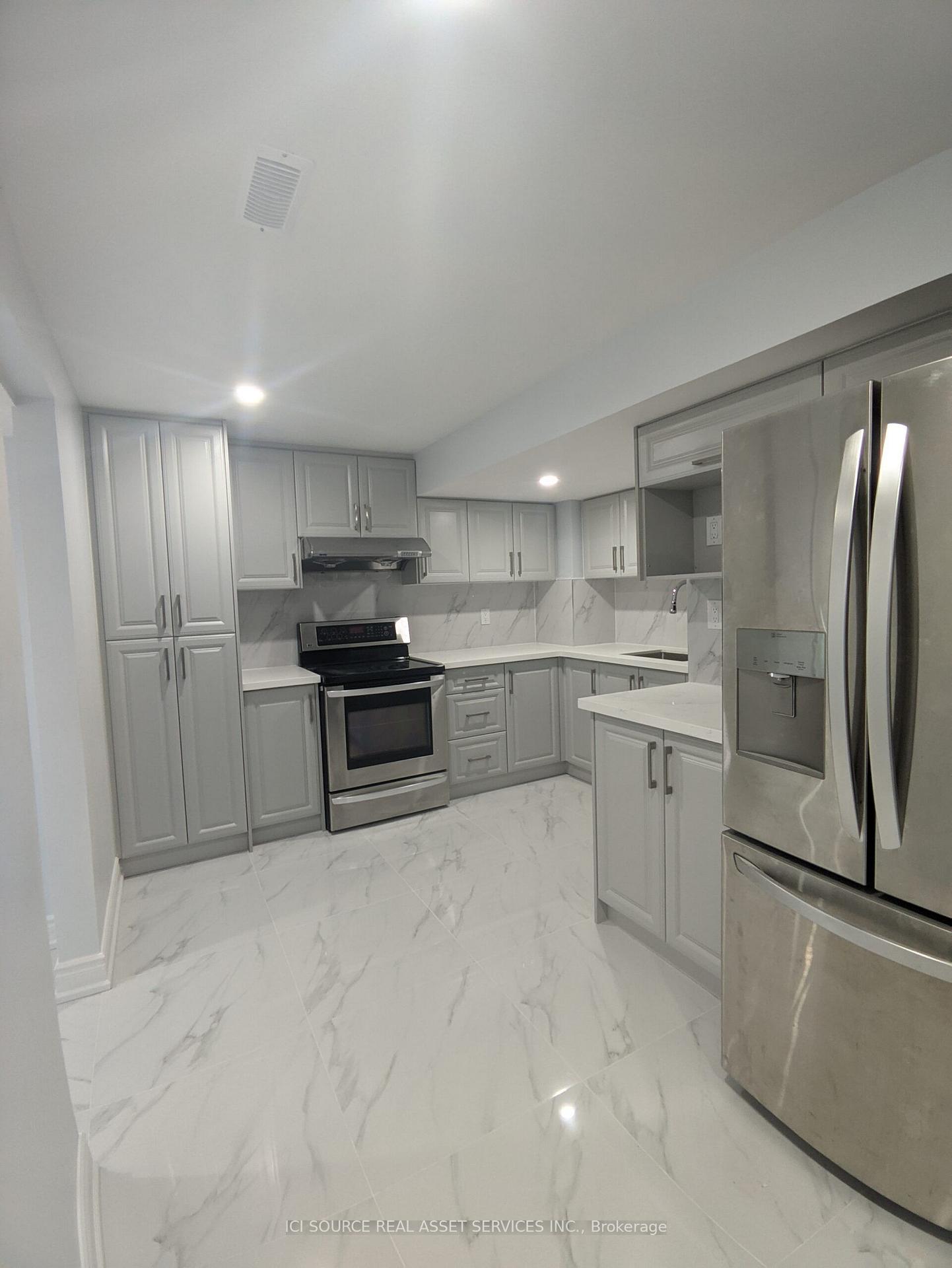 Lower Level - 51 Britannia Avenue Oshawa Ontario Canada Rent residential Megan Salas InCom Example New Demo Office