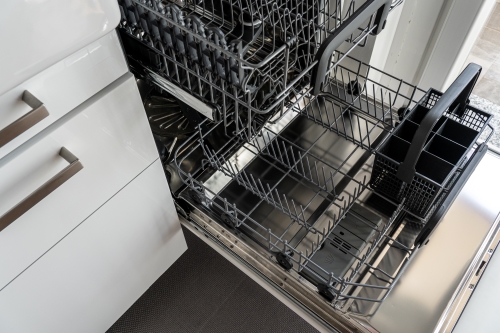 open dishwasher with dishes