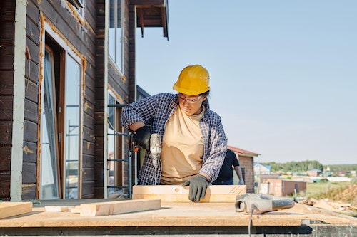 person holding a power tool