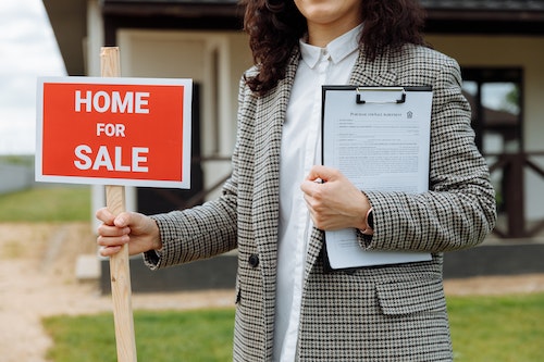 Person holding sign