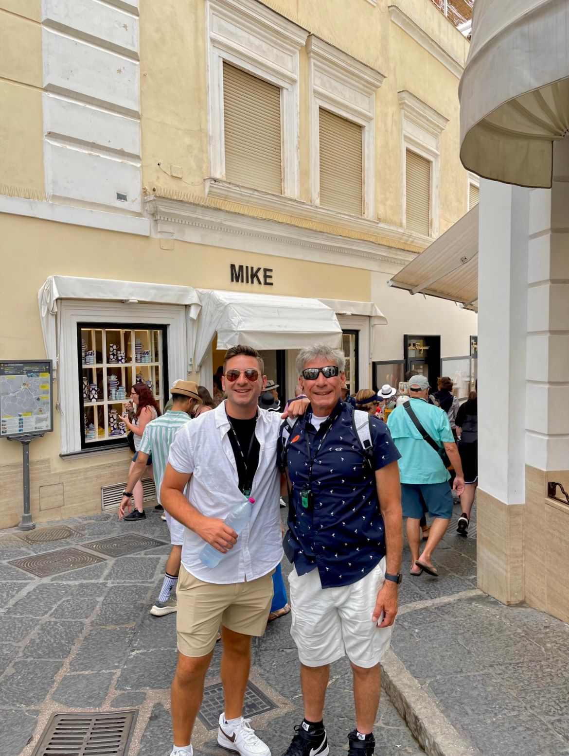 Me and my dad under a sign reading “MIKE”