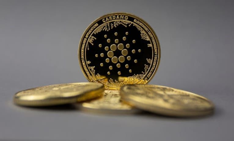 Cardano cleared by SEC; New AI altcoin stirs trader interest