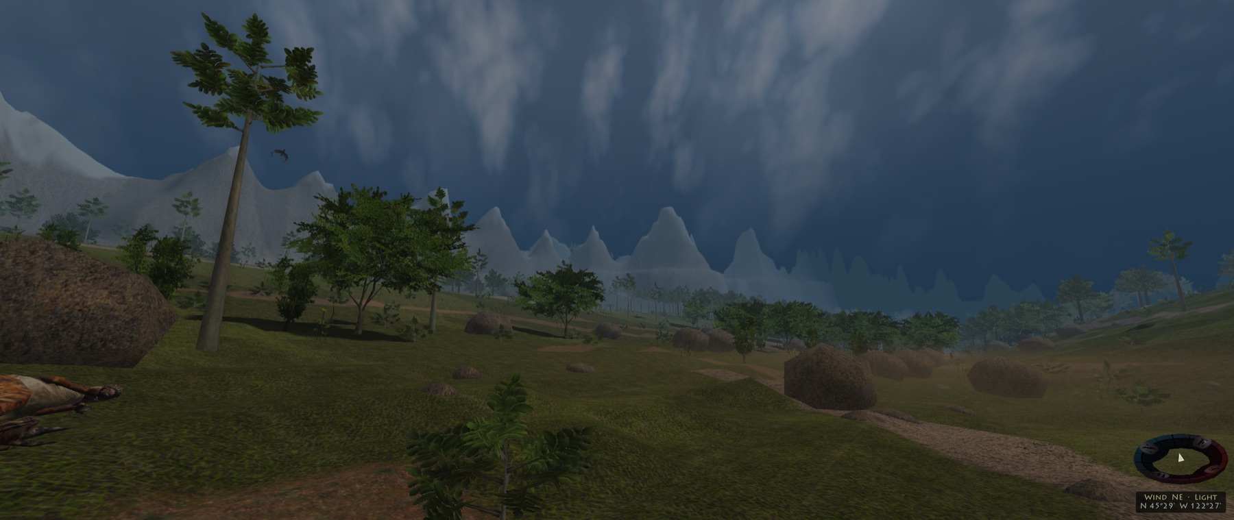 Storm cloud sweeping over a green valley