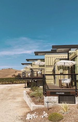 Genseo Inn balconies with umbrellas overlooking the vineyard at Cass Winery in Paso Robles