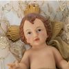 Figura Decorativa Alexandra House Living Plástico Dorado Niño Jesús 16 X 17 X 28 Cm Cojín