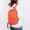 Dam Mini Mochila Impermeable. 23x11x35 Cm. Color: Naranja