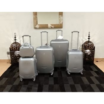 Set 4 Maletas + Un Neceser 4 Ruedas Giratorias Silver