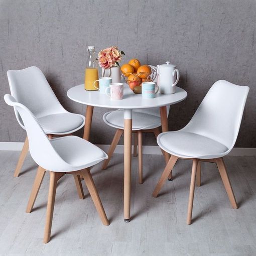 Conjunto de 4 sillas eiffel blancas con una mesa redonda de 800 cm de  diametro