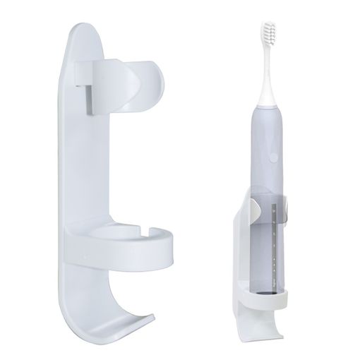 Nuevo cepillo de dientes eléctrico sobre un soporte de carga sobre
