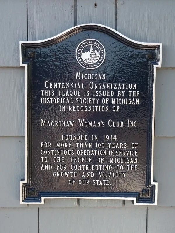 Historical Society of Michigan plaque honoring Mackinaw Woman's Club, Inc., founded 1914, for over 100 years of continuous service.