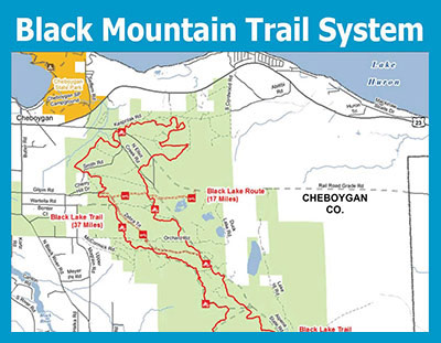 Map of the Black Mountain Trail System in Cheboygan County showing the Black Lake Trail (37 miles) and Black Lake Route (17 miles).