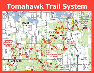 Map of the Tomahawk Trail System spanning Emmet, Cheboygan, and Charlevoix counties with multiple loop routes for motorcycles and ATVs.