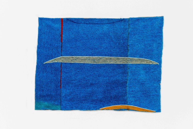 A textured blue square artwork featuring a horizontal gray shape near the top and a smaller horizontal brown curved shape near the bottom.