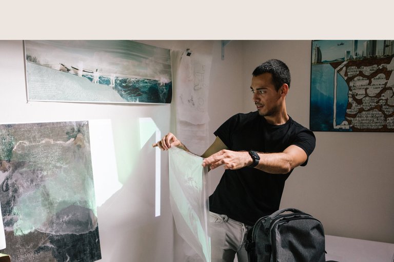 A student experiments with projected light.