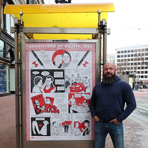 Justin Hall with his Daughters of Bilitis poster
