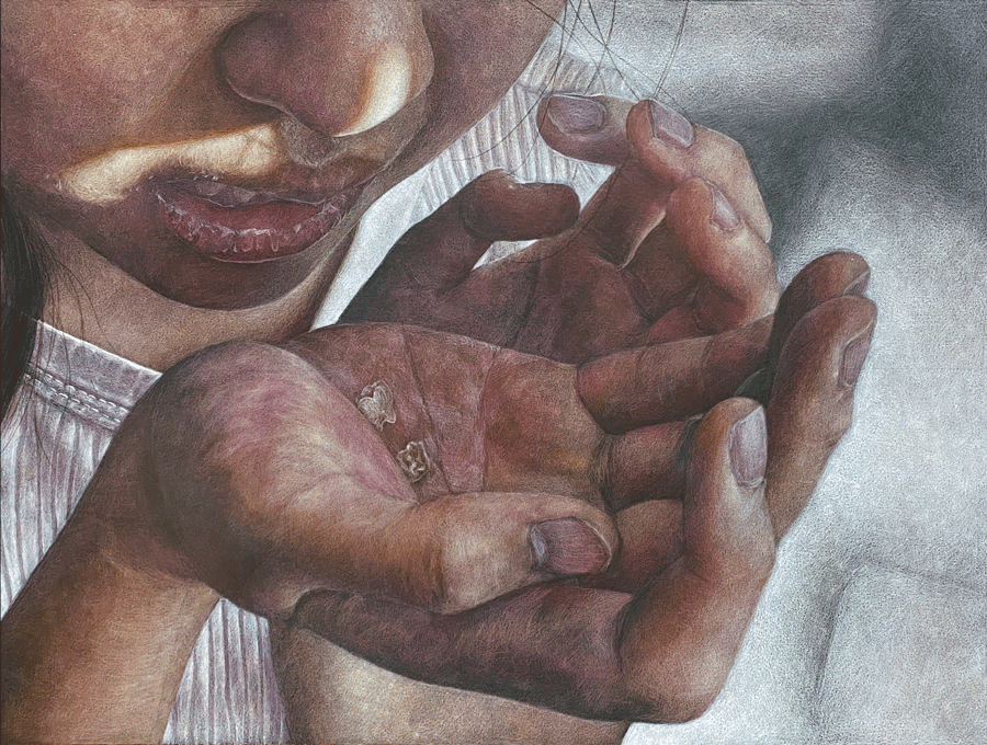 A drawing of a child's hand holding two teeth.