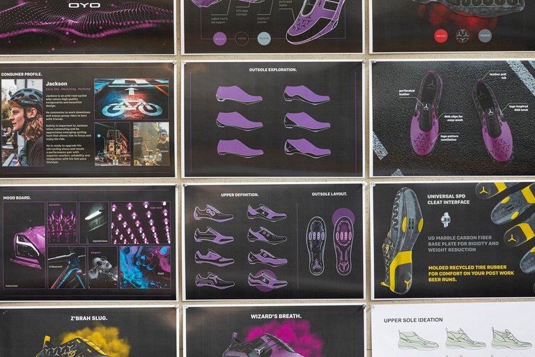 Photo of digital illustrations of various purple shoe designs