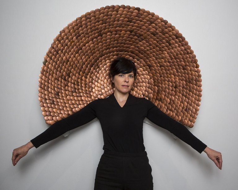 CCA Visiting Professor in the furniture Annie Evelyn in front of one of her designs.