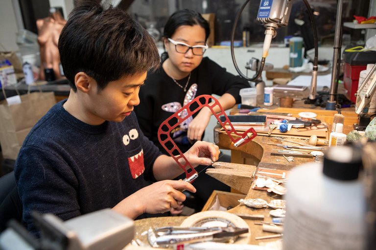 students working in the senior jewelry space