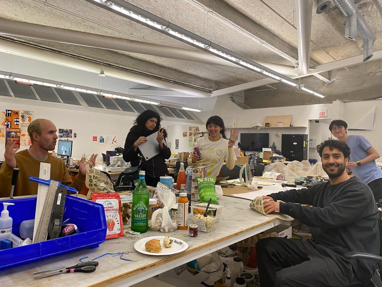 QT members Cole, Sav, Maria, and Farzad with a classmate late night in the CCA MFA Design studio, 2023