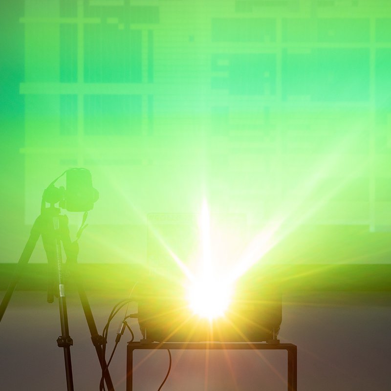 Bright green light emanating from a projector.