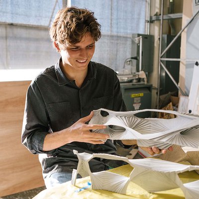 A student works on a model in the Digital Craft Lab.