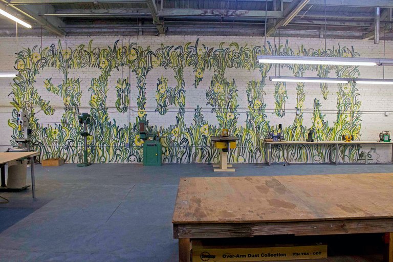 Image of a “Stockton” mural decorating the new workshop spaces at Hatch Workshop.