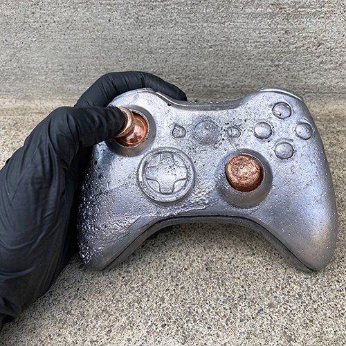 Rachel Berger, Bullet I, 2021. Cast lead and copper, 6 x 4 x 2.5 inches. Courtesy of the artist.