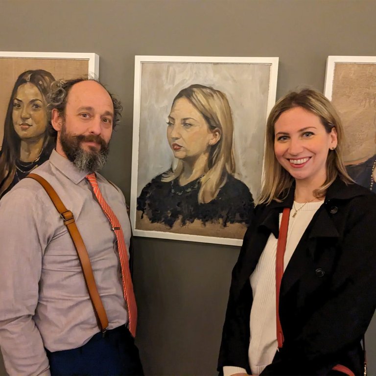 From left, Zimmerman with Kelly Autumn Carroll, flanking her portrait at Fort Hamilton Distillery.