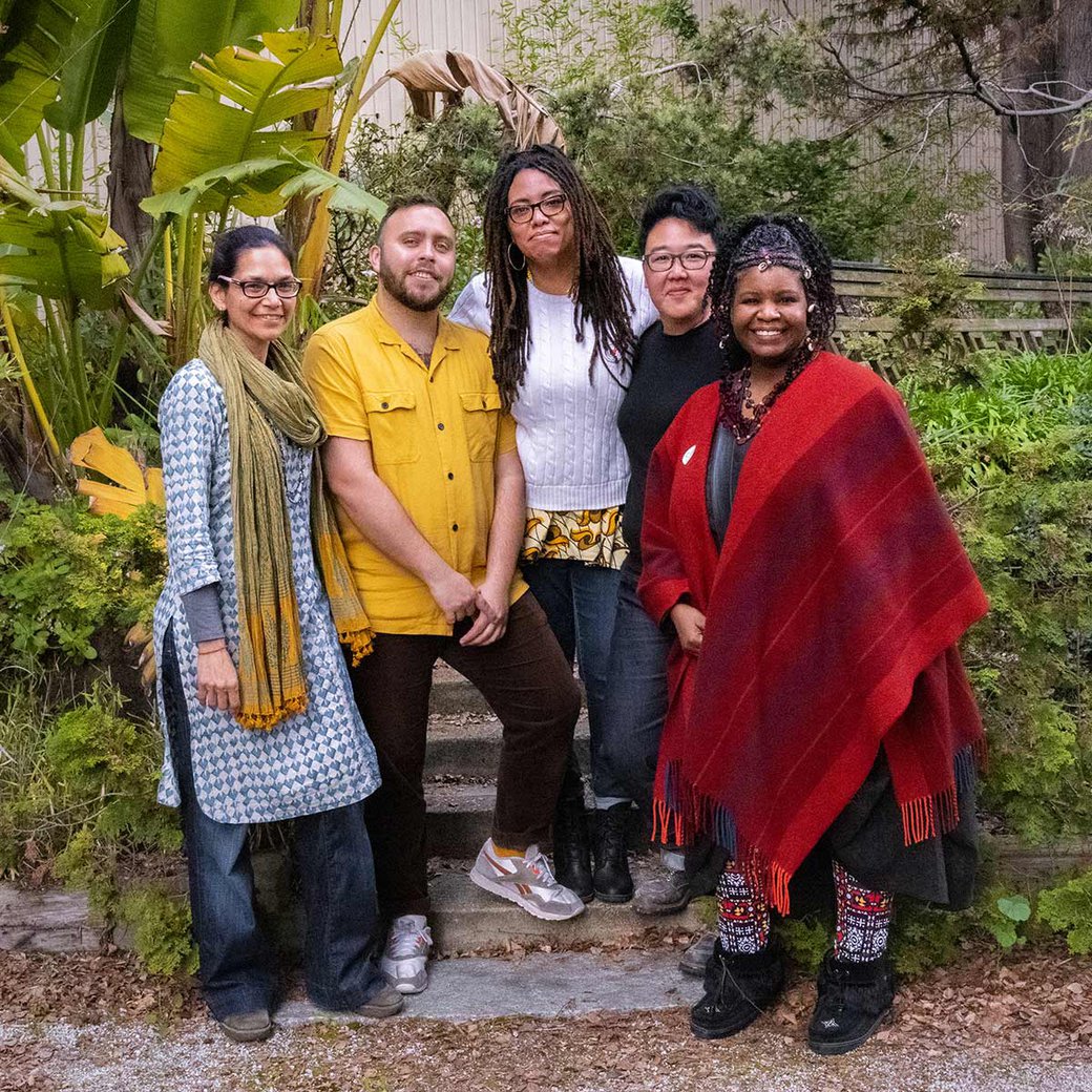 Five people stand together for a photo at the Decolonizing Conference at CCA.