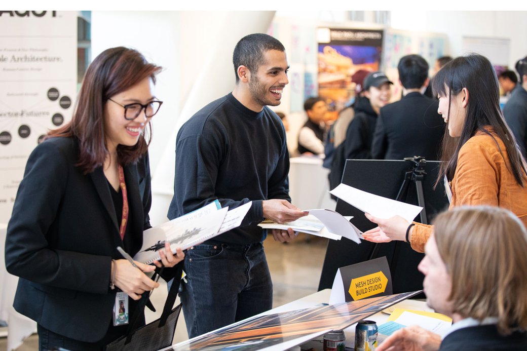 Students connect with prospective employers at the career expo.